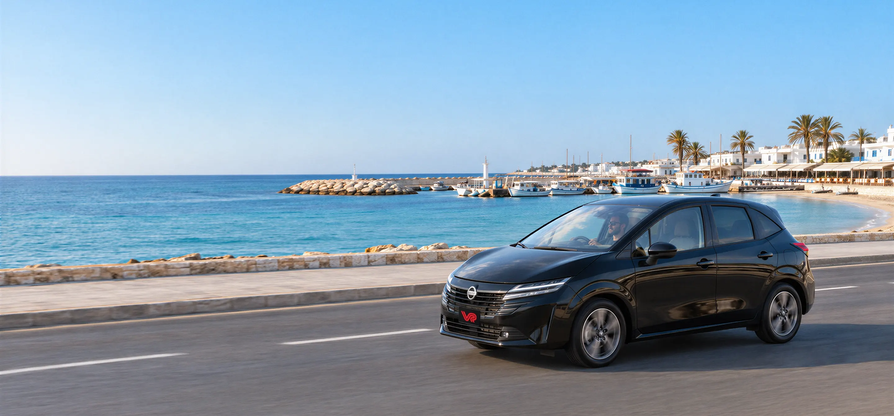 A VibeRide hire car on a coastal road in Cyprus